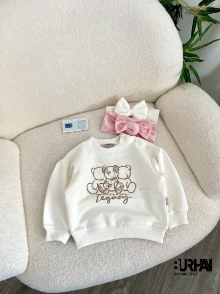 أبيض بنقشة بني